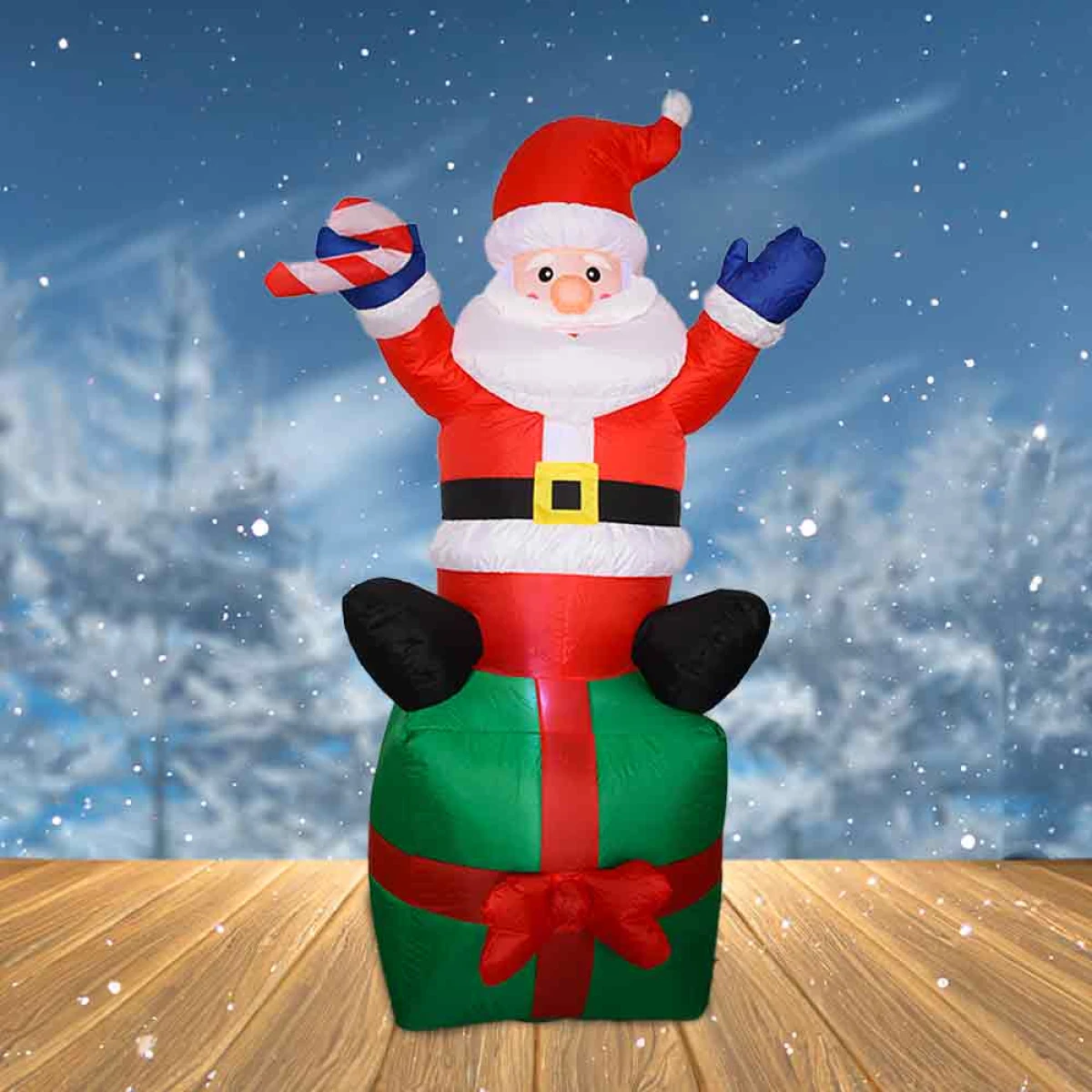 Papá Noel Inflable Gigante sobre Regalo
